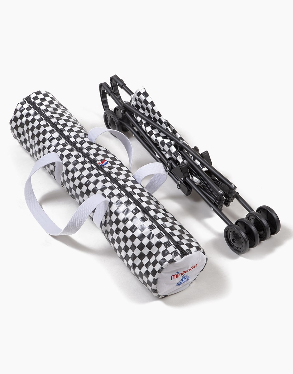 Minikane X Delage – Sac à poussette Racing Damier noir/blanc, sangles blanches