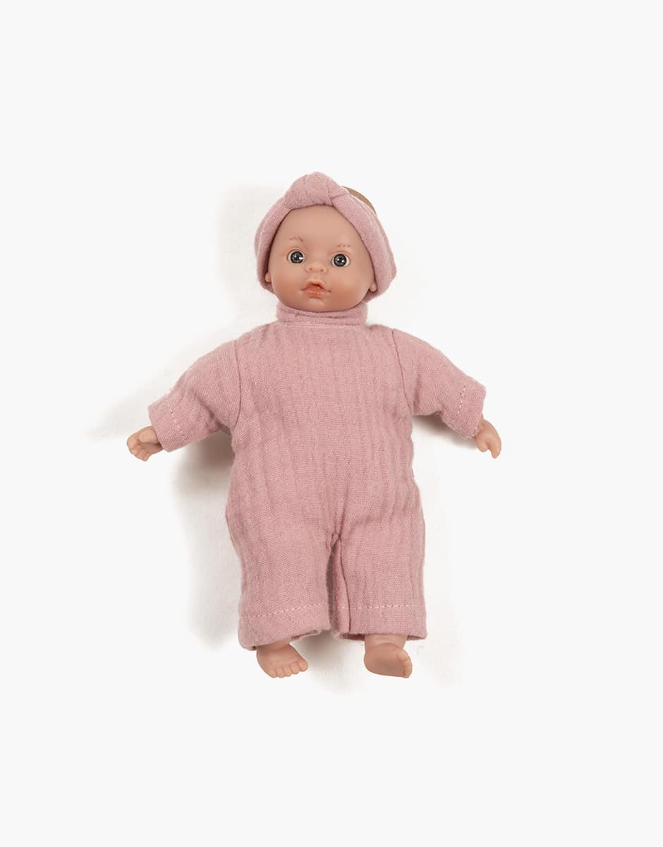 Mini poupée Téa aux yeux clairs en body et headband rose thé