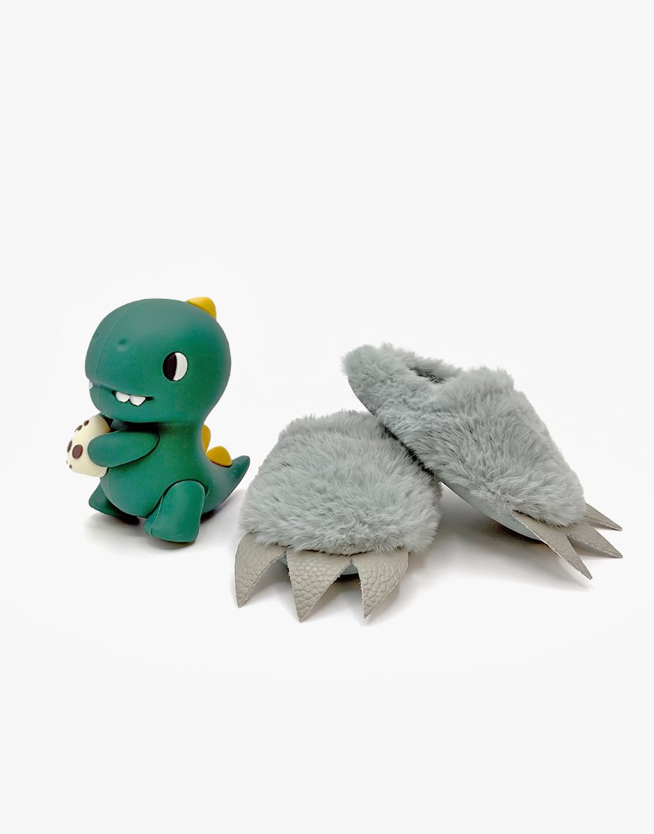 Chaussons dinosaure en fausse fourrure vert de gris et son jouet