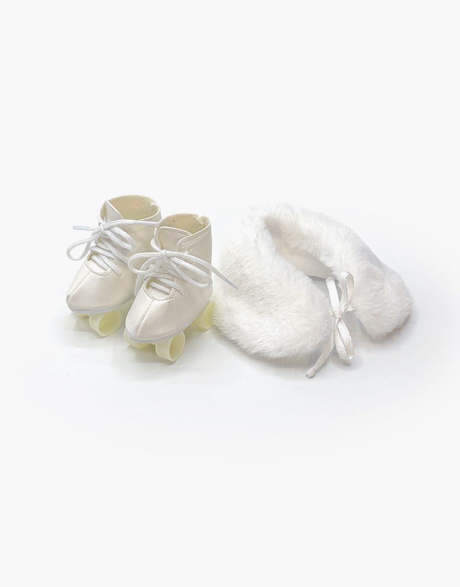 Lot accessoires de ski Mini Panchas avec cache épaules et paire de patins blancs
