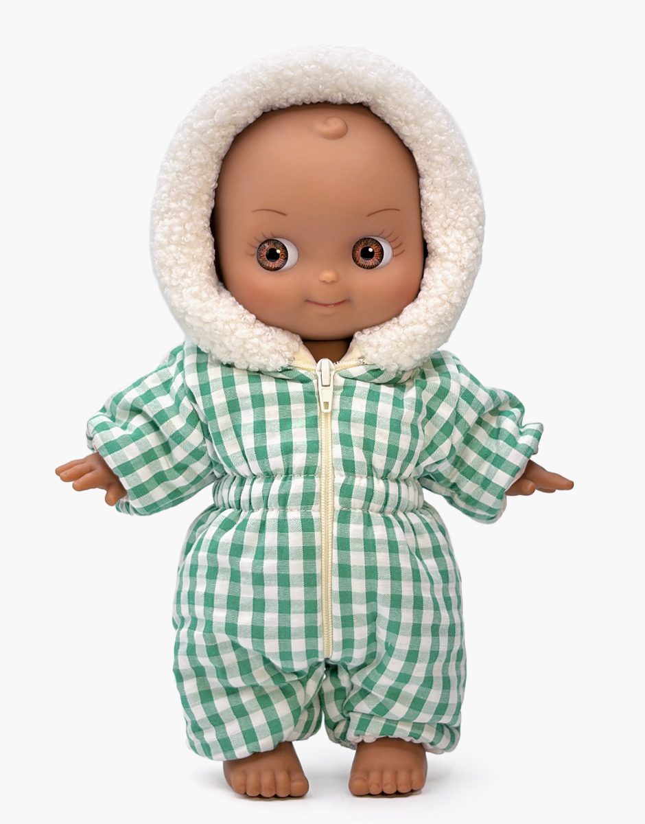 Noah au ski et sa combinaison Gigi Vichy vert