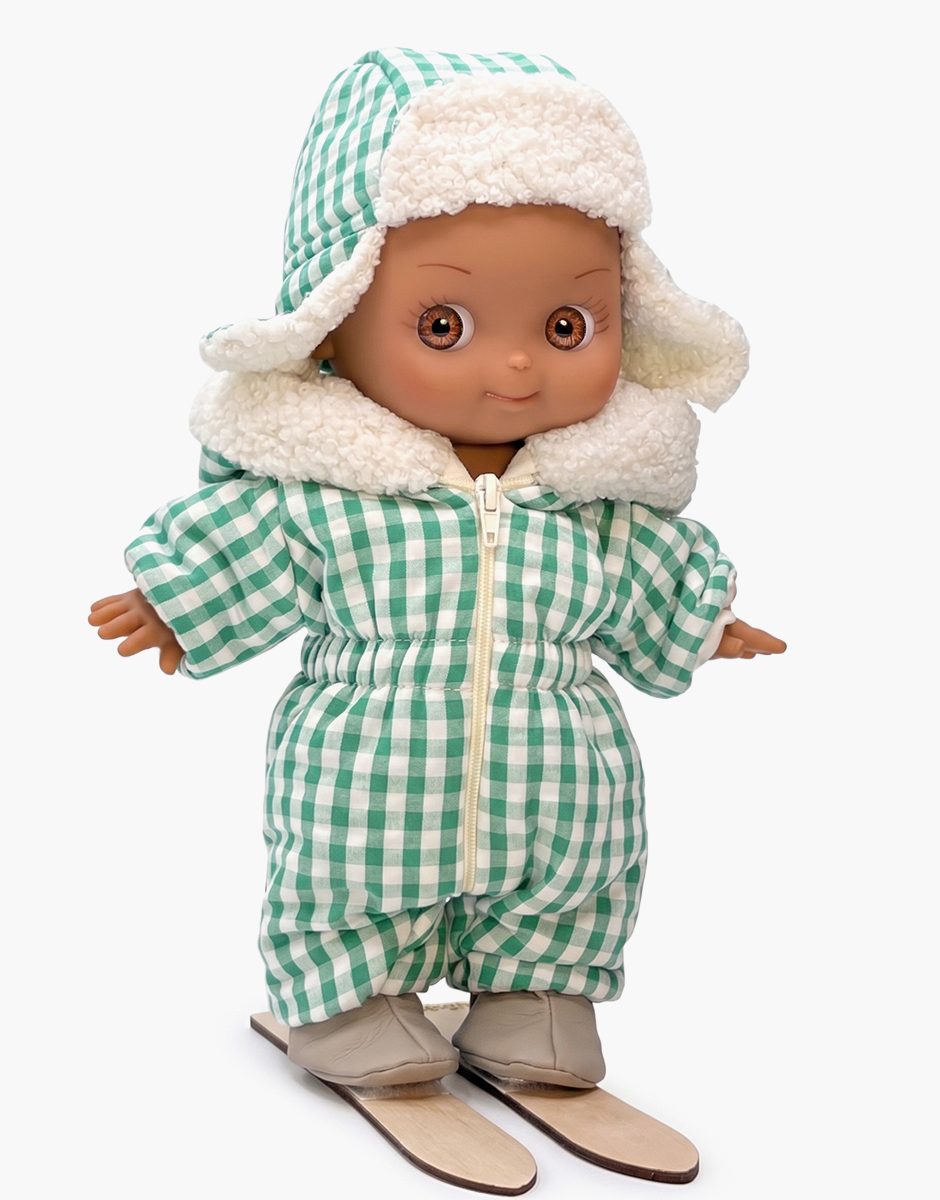 Noah au ski et sa combinaison Gigi Vichy vert